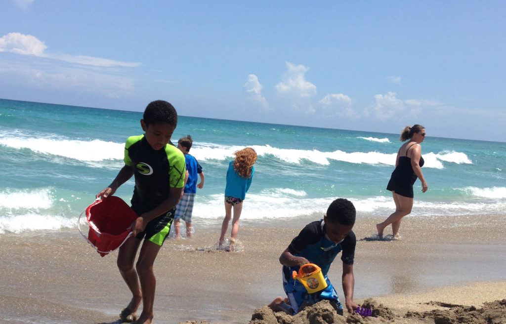 kids playing on the beach