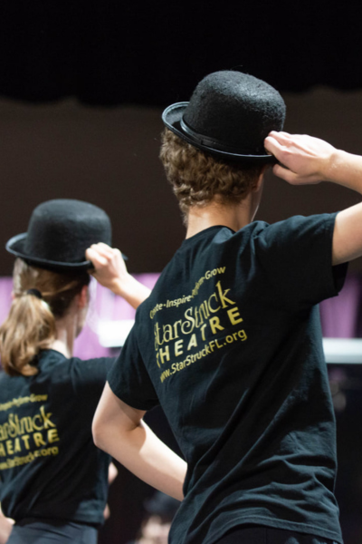 theatre kids in their little theatre hats doing theatre things